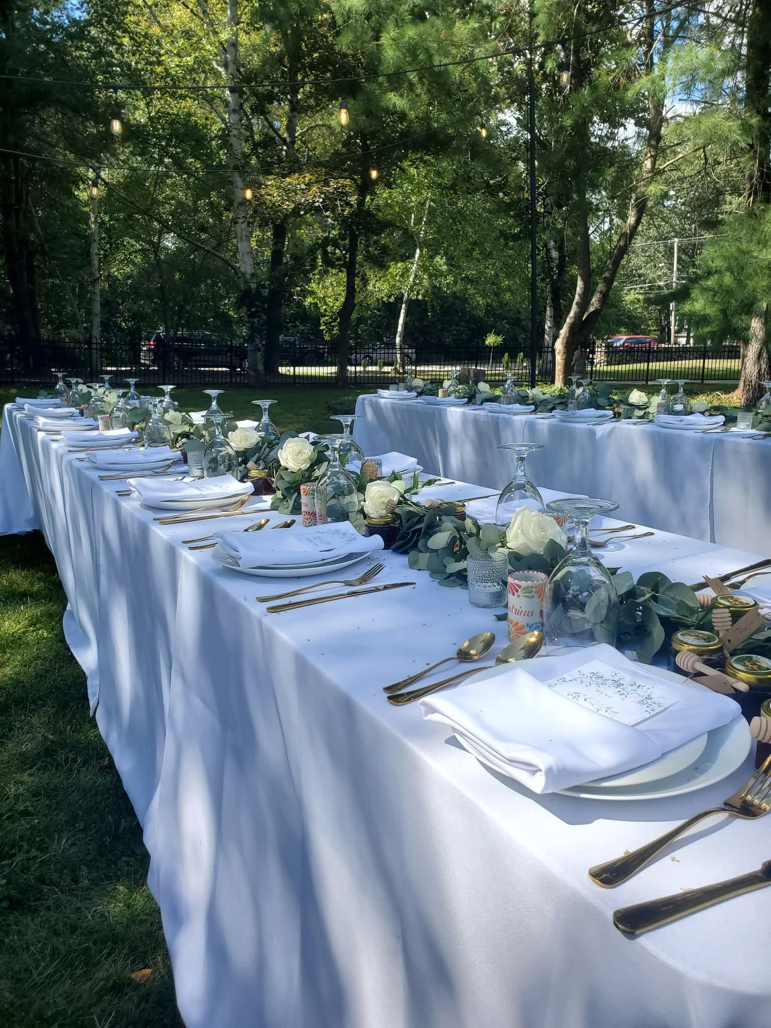 Outdoor garden dinner event setup
